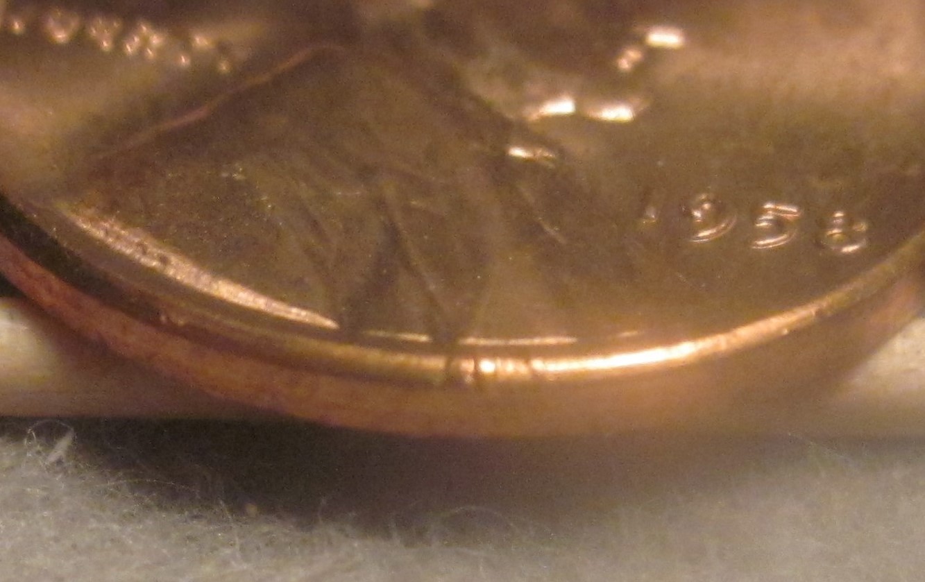 1958-Wheat-Penny-With-Part-Of-Lettering-Stamped-On-Rim/Edge?